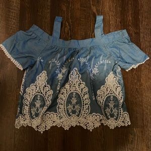 The cutest denim and lace crop top.